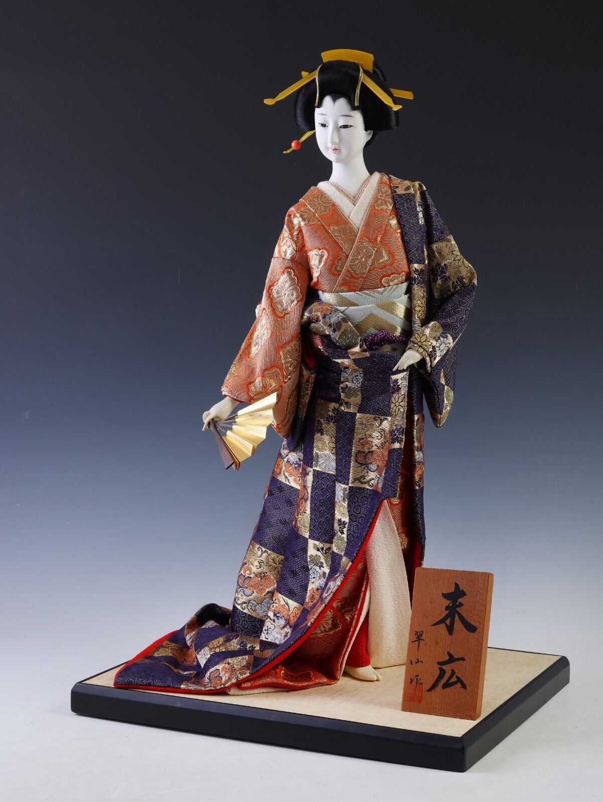 Japanese Traditional Geisha Doll with Vintage Charm Kimono and Fan Collectible.